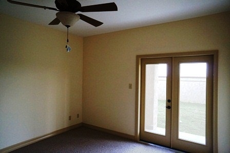 8216 Casa Verde Road, Unit E158 Laredo, TX 78041 - Photo 7 of 20 an empty room with windows