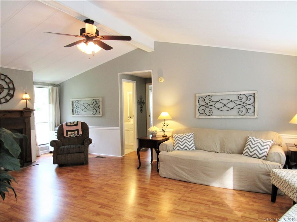2172 Mission Road York, SC 29745 - Photo 14 of 30 a living room with furniture and a fireplace
