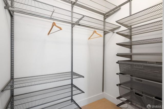 a view of a room with racks on the wall