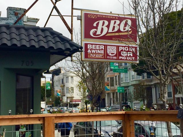 a kitchen with a table and chairs