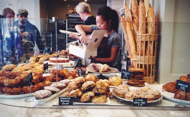 a big yard with trees and grass