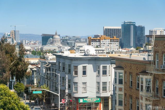 a view of a city with tall buildings