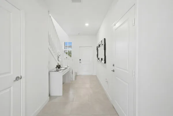 a view of entryway with white walls
