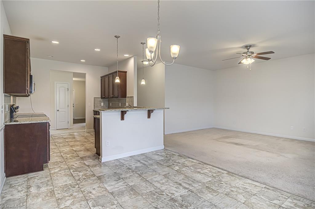 588 Forage Drive High Point, NC 27265 - Photo 32 of 33 You will love this open floor plan between living room, dining room, and kitchen!