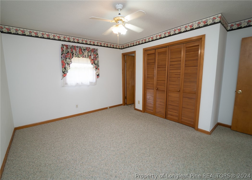 141 Union Church Road Carthage, NC 28327 - Photo 20 of 31 a view of empty room with fan