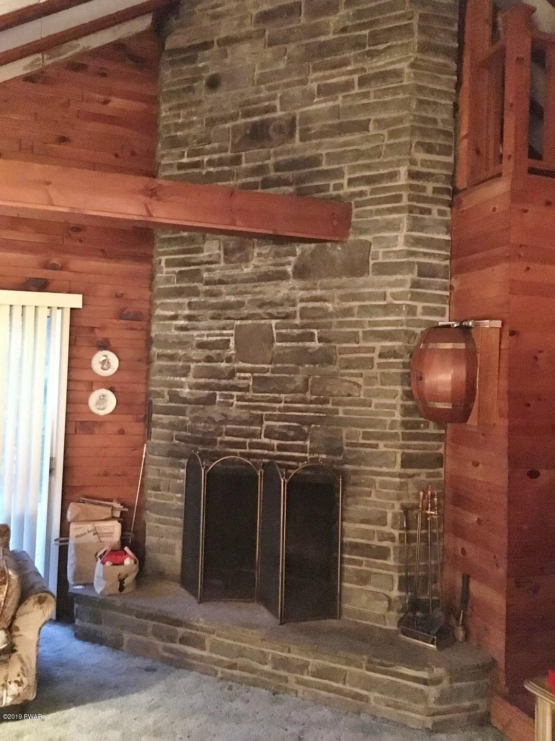 110 Elm Road Tafton, PA 18464 - Photo 15 of 31 2 Story Stone Fireplace