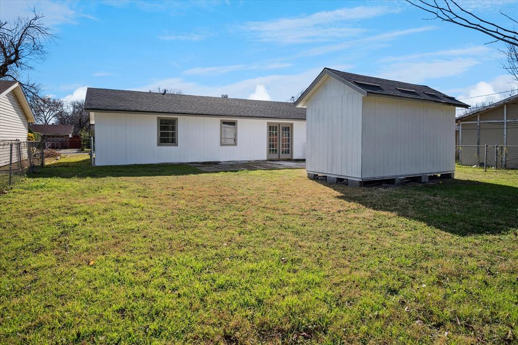 1809 Dunning Street Irving, TX 75061 - Photo 11 of 35 a view of a house with a yard