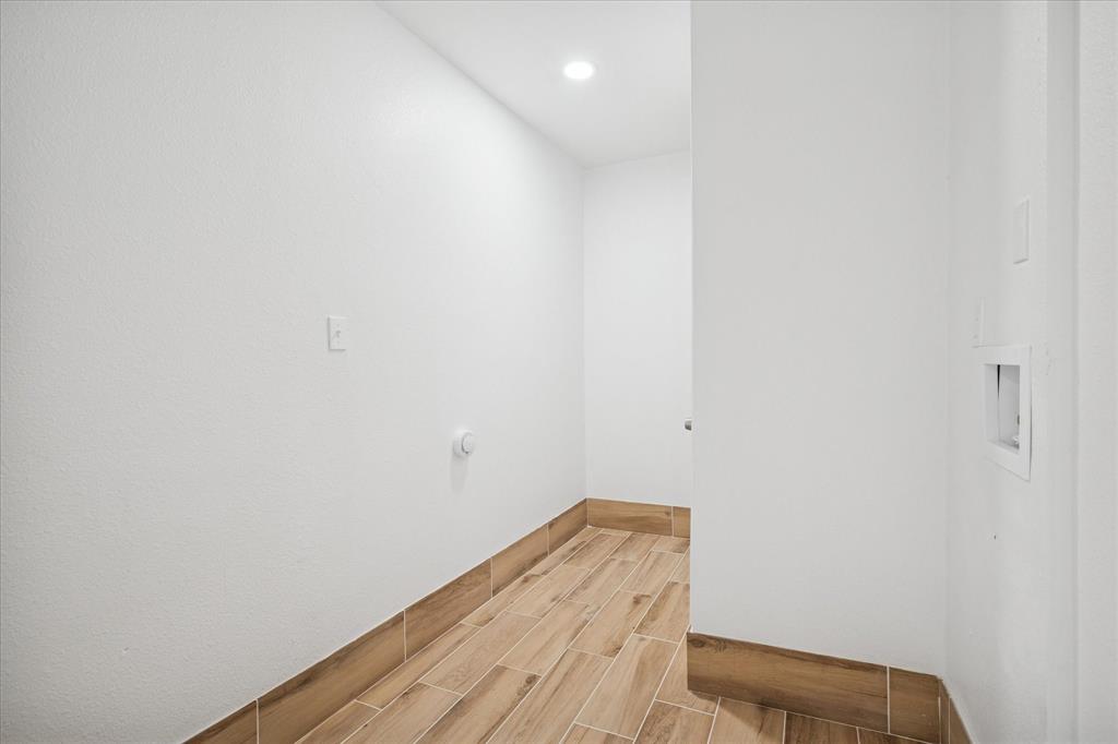 1809 Dunning Street Irving, TX 75061 - Photo 29 of 35 a view of room with wooden floor