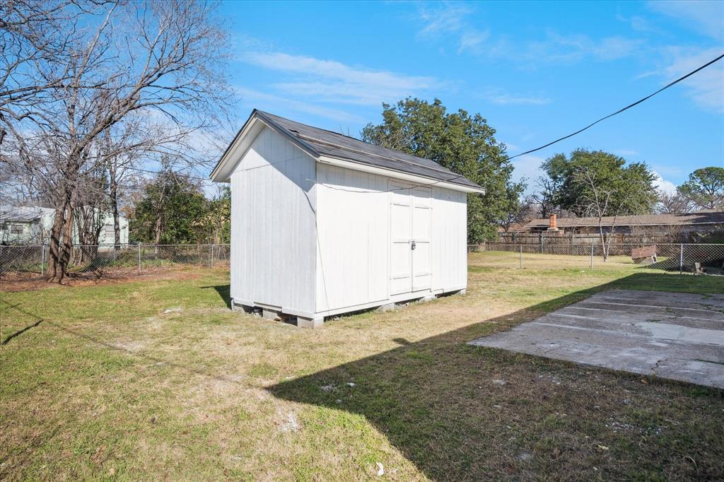 1809 Dunning Street Irving, TX 75061 - Photo 32 of 35 a view of a backyard with large trees