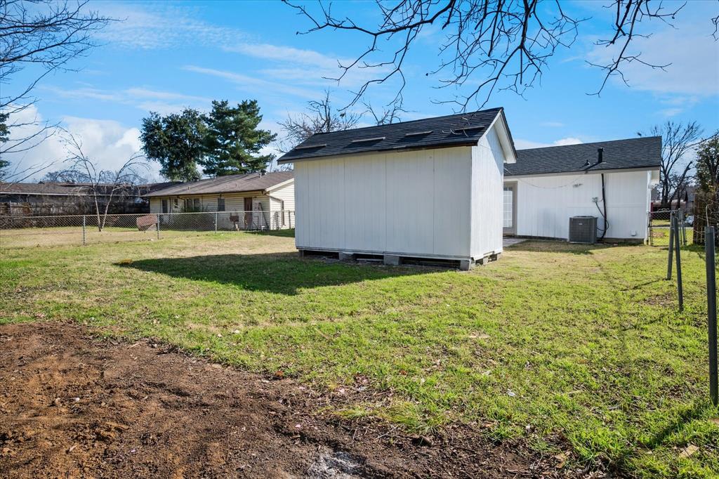 1809 Dunning Street Irving, TX 75061 - Photo 33 of 35 a view of a house with backyard and sitting area