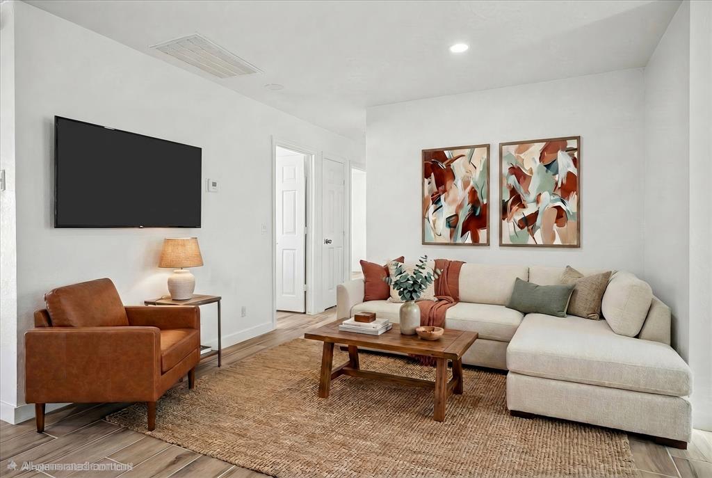 1809 Dunning Street Irving, TX 75061 - Photo 4 of 35 a living room with furniture and a flat screen tv