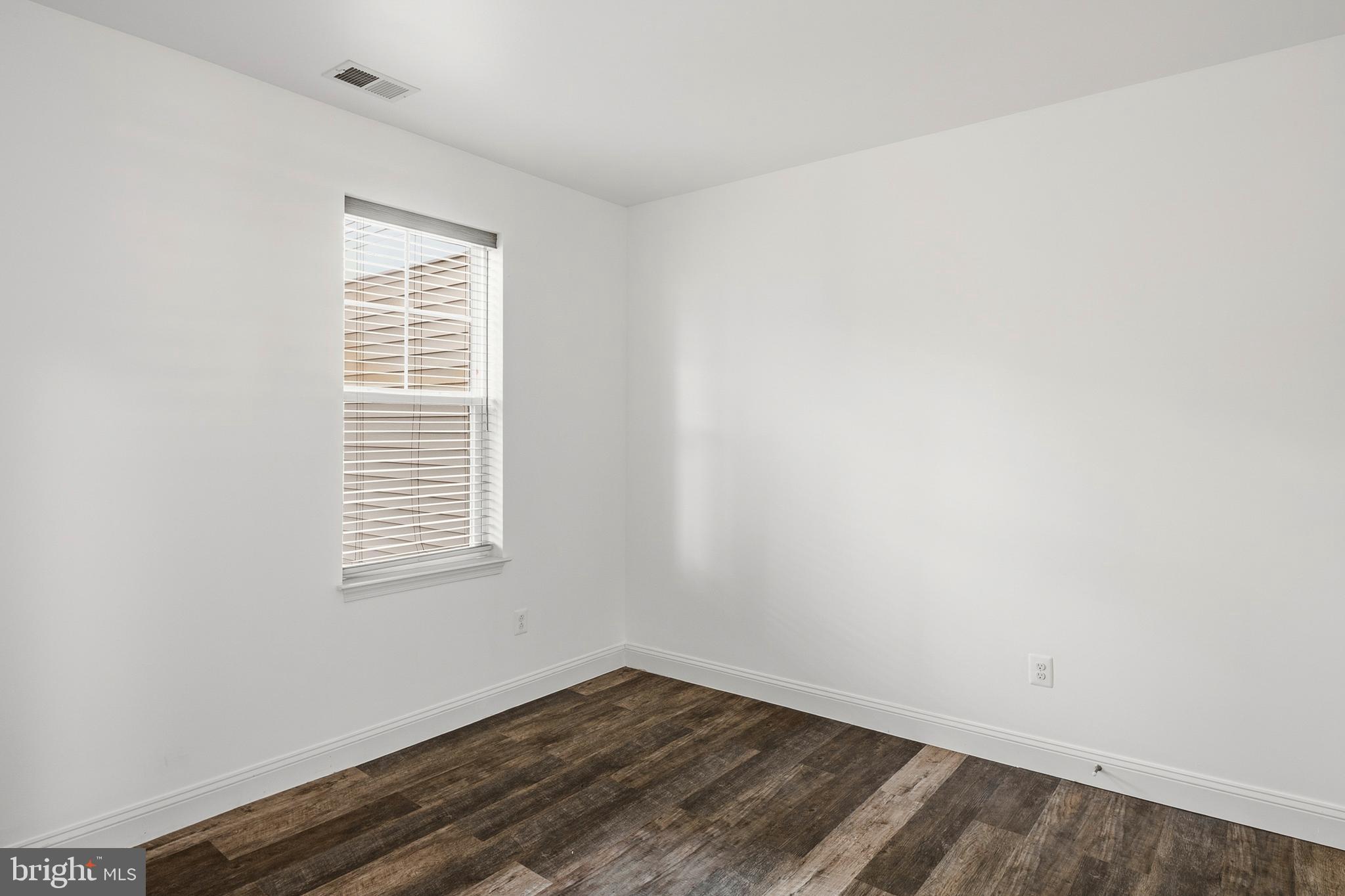 33 Greensborough Road Reisterstown, MD 21136 - Photo 6 of 40 an empty room with a window