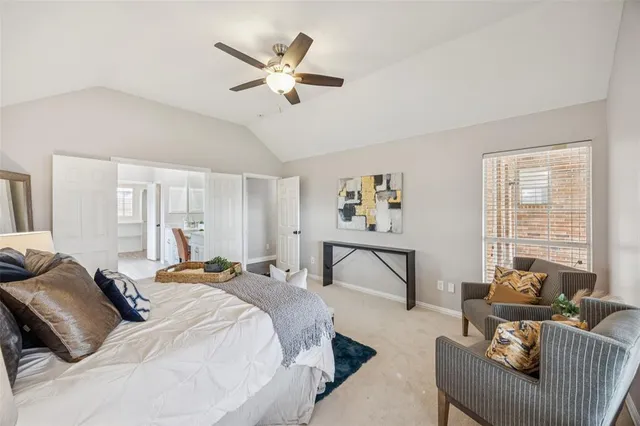 a bedroom with furniture and a window