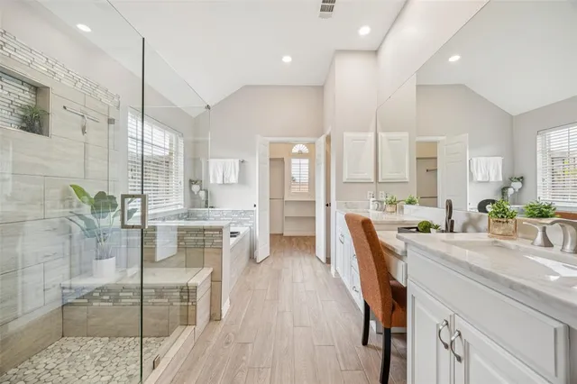 a kitchen with counter top space a sink cabinets and appliances