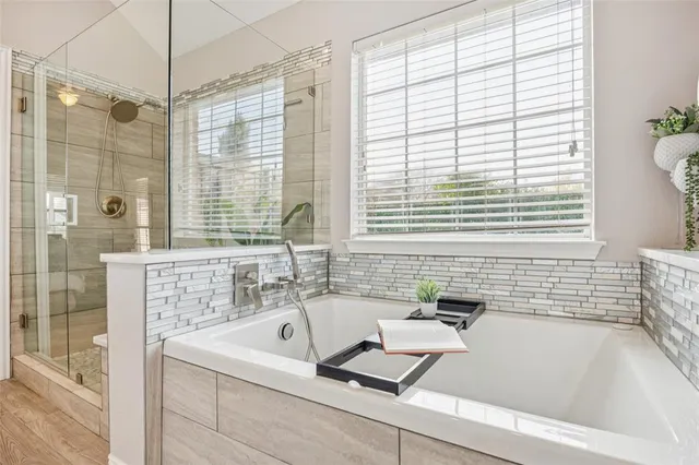 a bathroom with a sink and a bathtub
