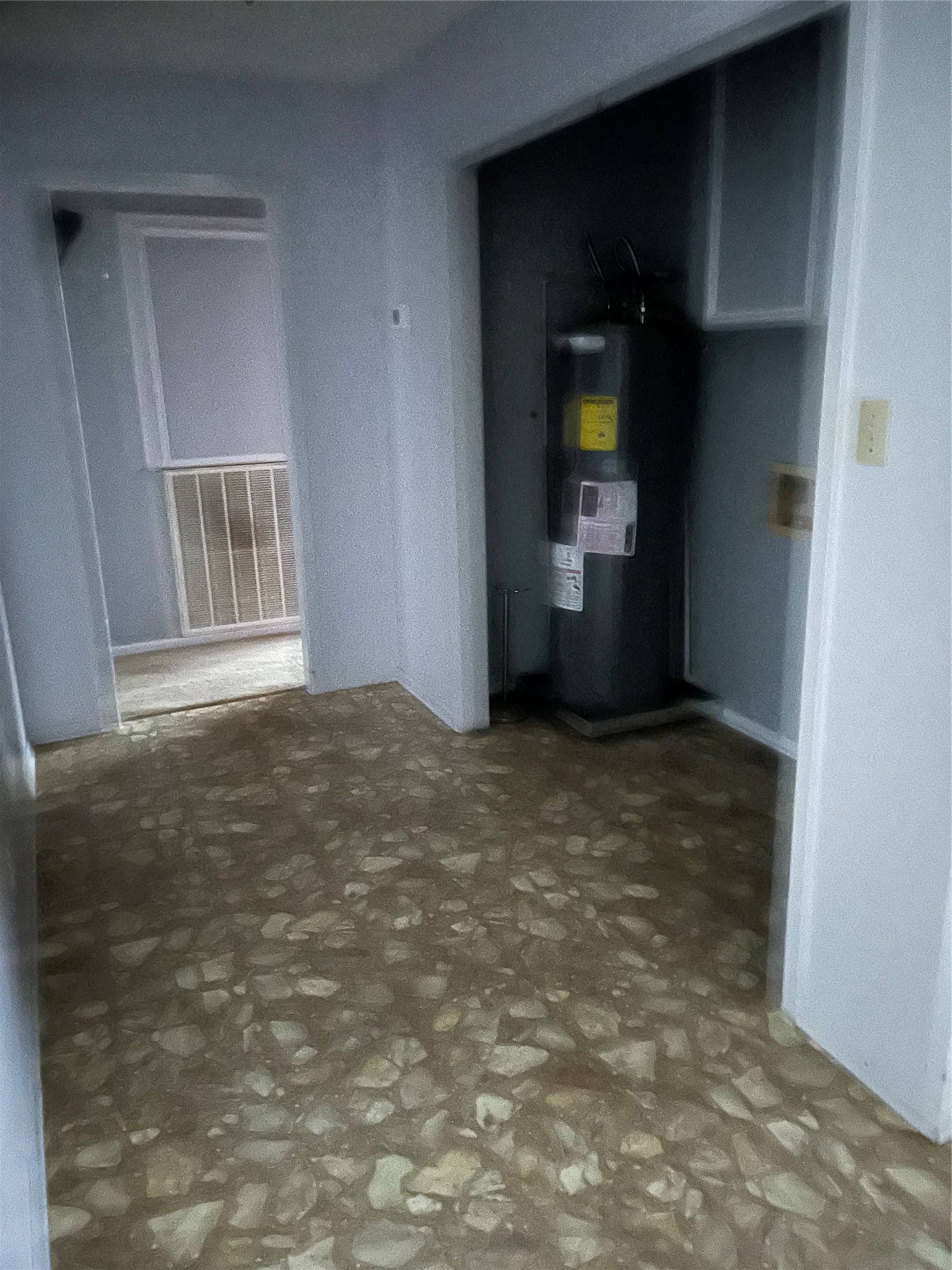 12022 Annette Road, Unit CR657 Angleton, TX 77515 - Photo 9 of 26 a view of an empty room with wooden floor and a window
