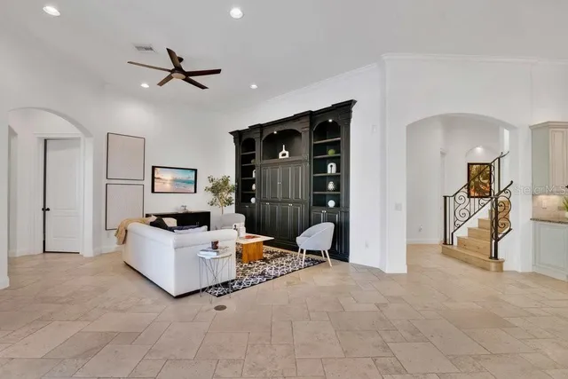 a spacious bedroom with a bed and window