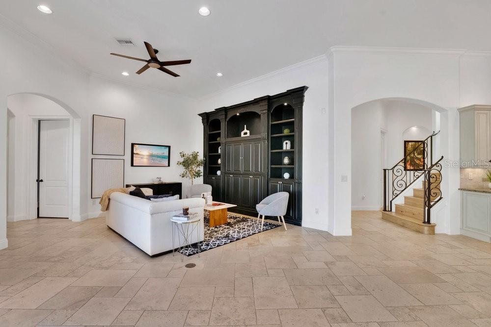 9204 Tibet Pointe Circle Windermere, FL 34786 - Photo 15 of 72 a living room with furniture and a ceiling fan