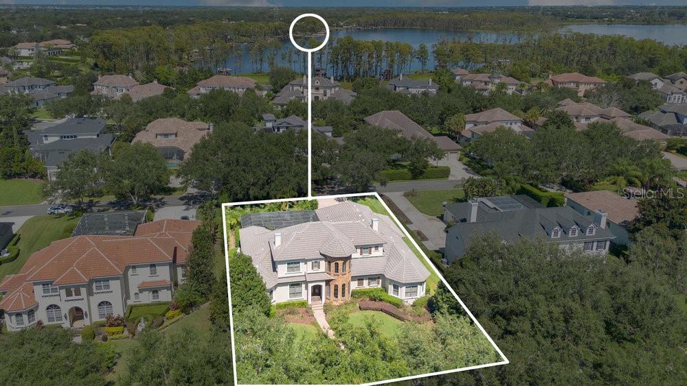 9204 Tibet Pointe Circle Windermere, FL 34786 - Photo 2 of 72 an aerial view of house with yard swimming pool and outdoor seating