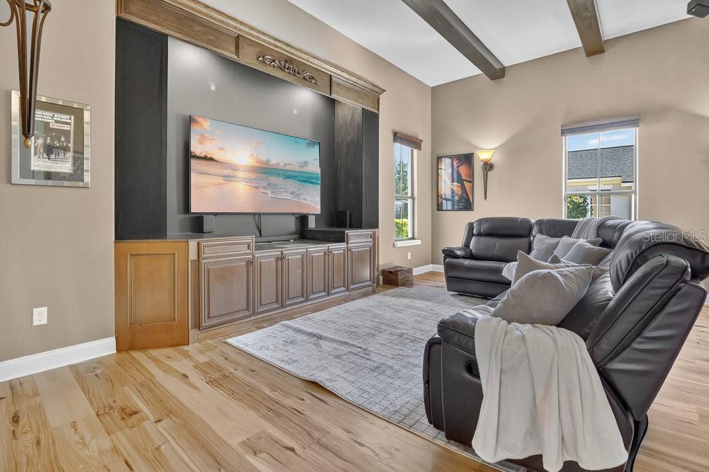 9204 Tibet Pointe Circle Windermere, FL 34786 - Photo 29 of 72 a living room with furniture and a flat screen tv