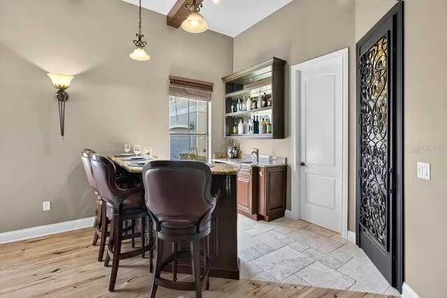 a bedroom with a bed and a window with the outer view