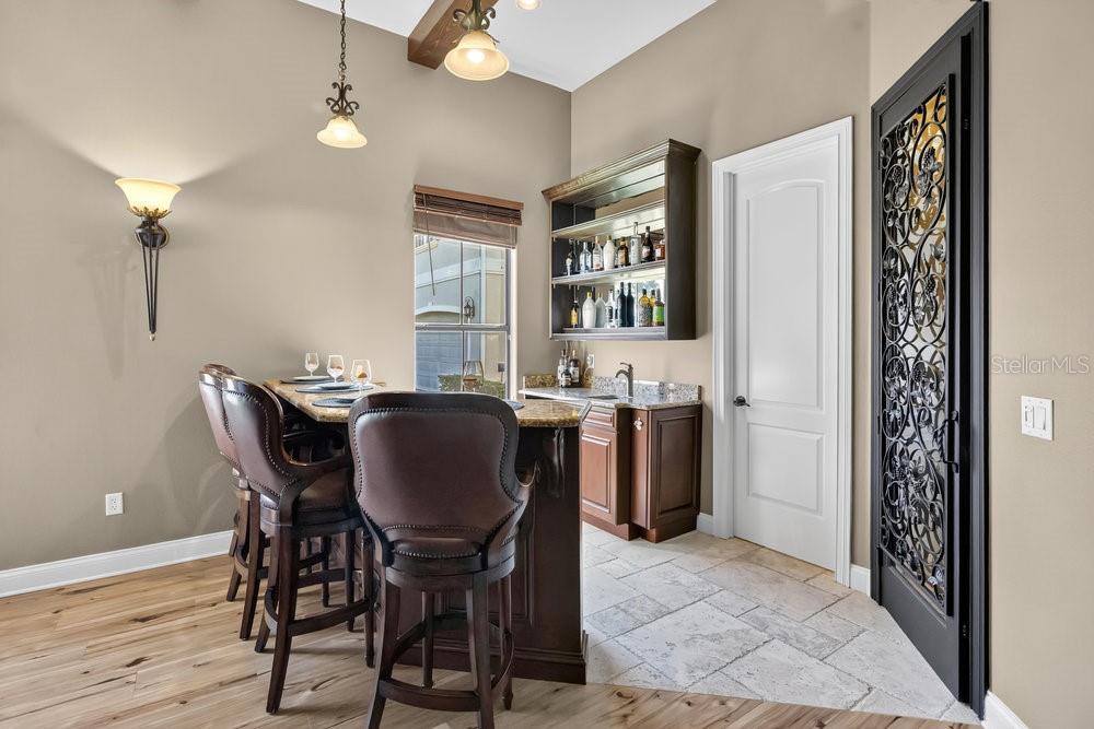 9204 Tibet Pointe Circle Windermere, FL 34786 - Photo 31 of 72 a dining room with furniture and window