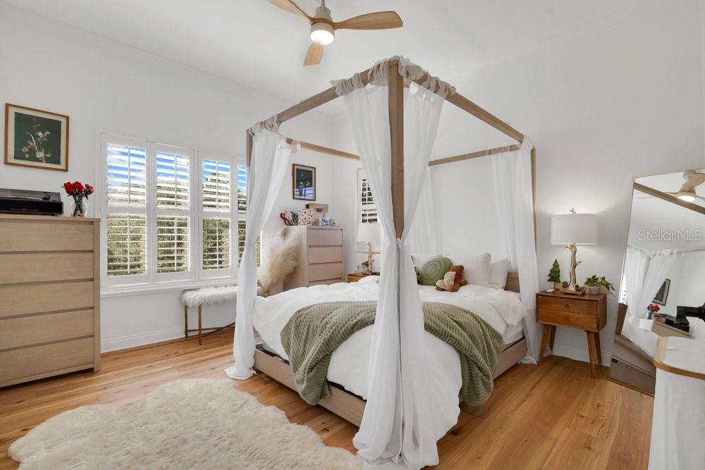 9204 Tibet Pointe Circle Windermere, FL 34786 - Photo 37 of 72 a bedroom with a bed and a window