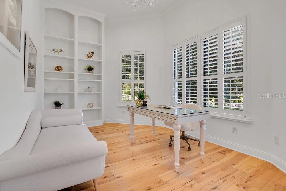 9204 Tibet Pointe Circle Windermere, FL 34786 - Photo 41 of 72 a bedroom with a bed and a window with the outer view