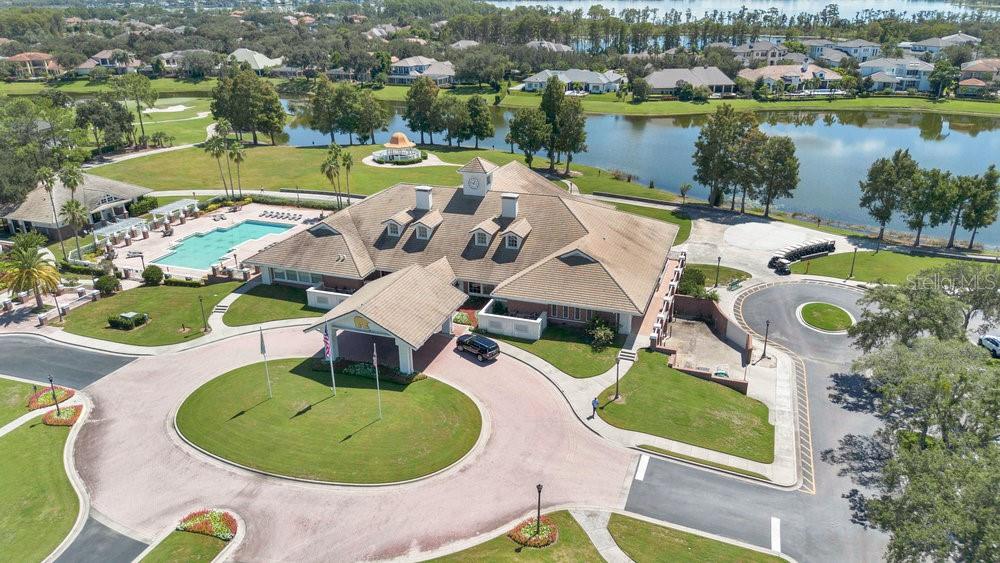 9204 Tibet Pointe Circle Windermere, FL 34786 - Photo 64 of 72 an aerial view of a house with swimming pool and a yard