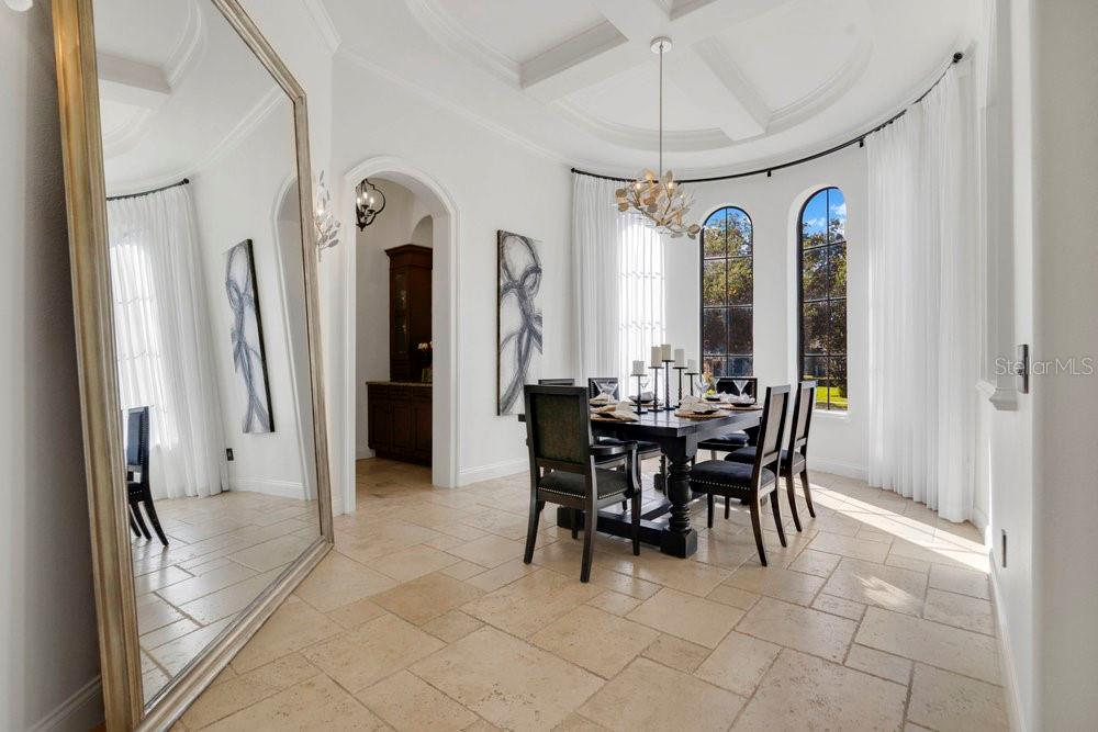 9204 Tibet Pointe Circle Windermere, FL 34786 - Photo 7 of 72 a view of a dining room with furniture window and outside view
