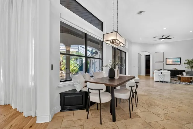 a kitchen with stainless steel appliances a sink stove and refrigerator