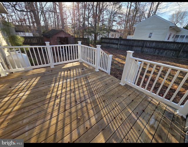 37686 Holly Street Ocean View, DE 19970 - Photo 10 of 10 a view of deck with wooden floor and fence