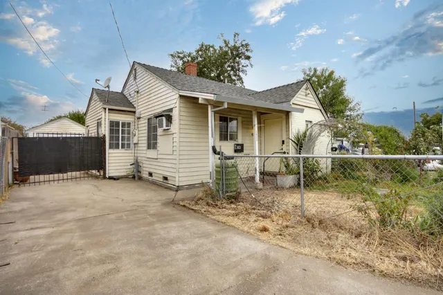 a backyard of a house with lots of green space