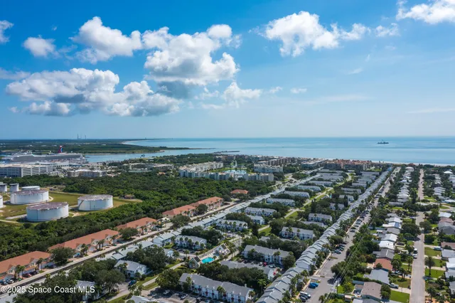 a view of swimming pool with a balcony