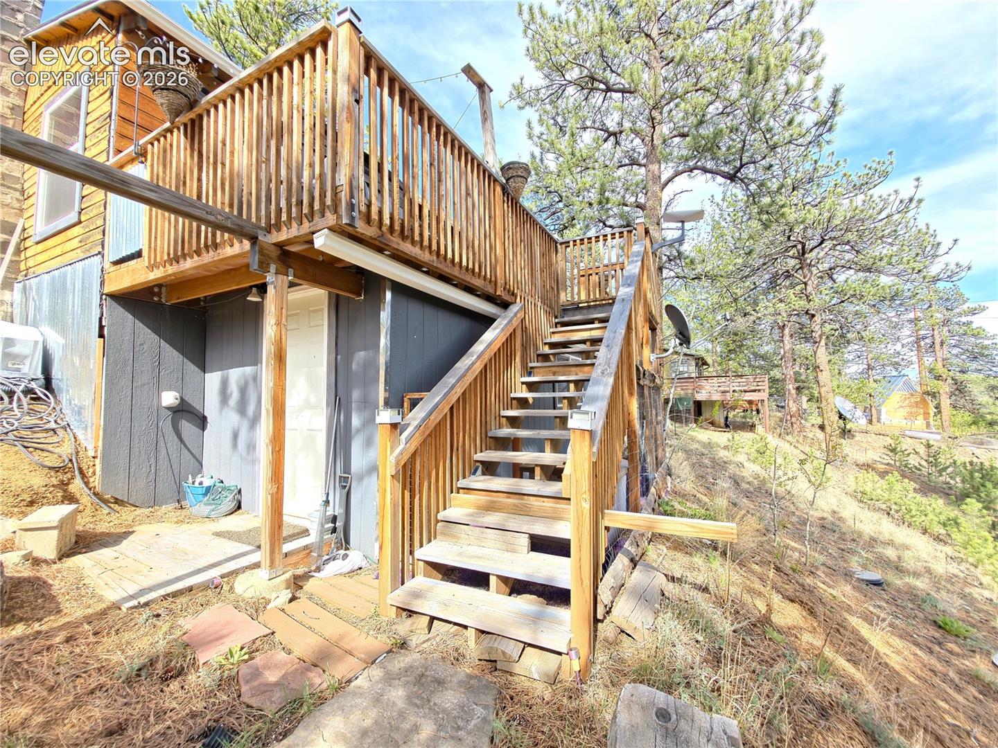 226 Hall Road Bailey, CO 80421 - Photo 25 of 37 Deck Access & Lower Level