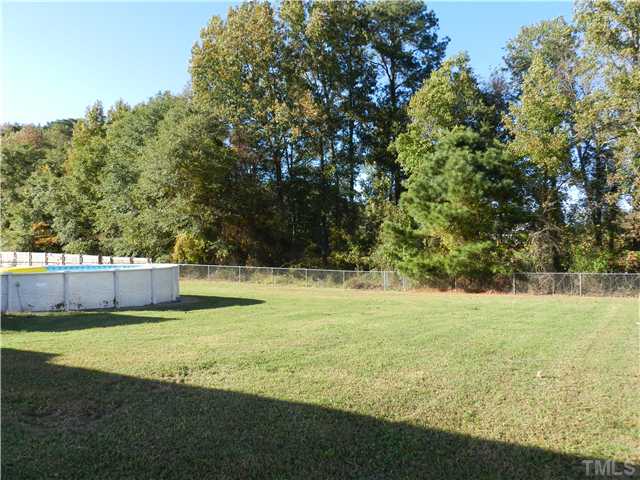 174 Roping Horn Way Willow Spring, NC 27592 - Photo 11 of 15 a view of an outdoor space and a yard