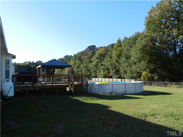 174 Roping Horn Way Willow Spring, NC 27592 - Photo 12 of 15 a view of patio with green space