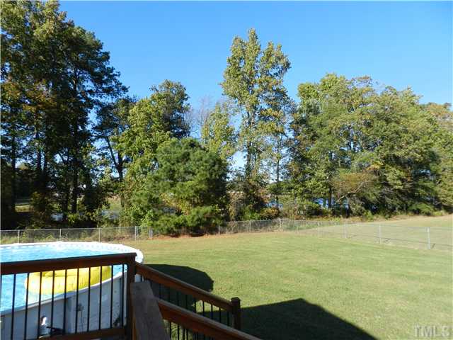174 Roping Horn Way Willow Spring, NC 27592 - Photo 13 of 15 a view of a swimming pool with a patio