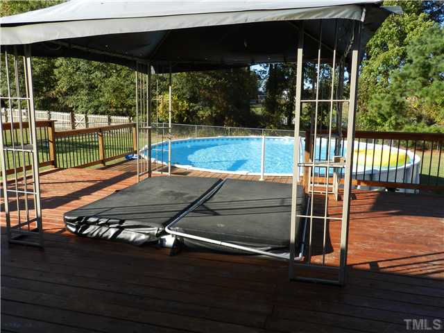 174 Roping Horn Way Willow Spring, NC 27592 - Photo 15 of 15 a outdoor view with a sitting space
