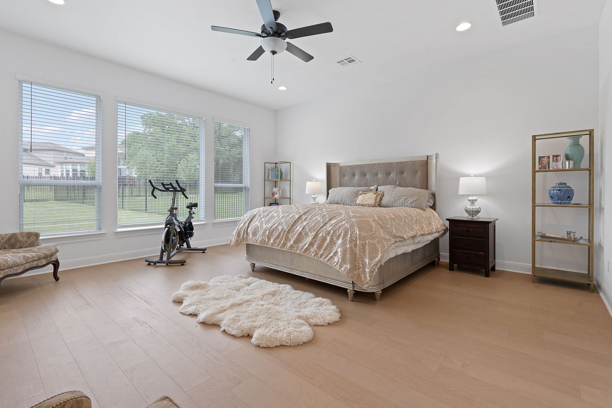 309 Pear Tree Lane Austin, TX 78737 - Photo 21 of 39 a bedroom with a bed and a couch