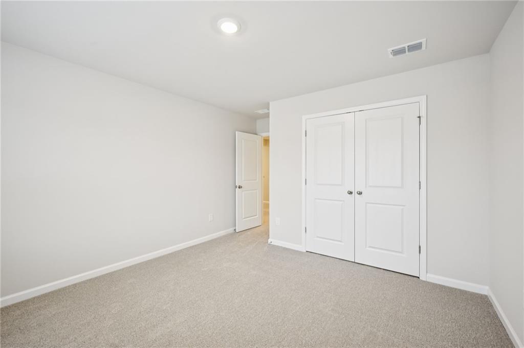 1408 High Fls Lane Grayson, GA 30017 - Photo 34 of 48 a view of an empty room