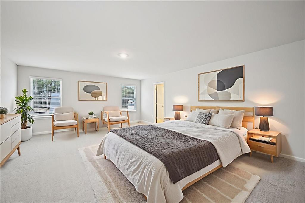 1408 High Fls Lane Grayson, GA 30017 - Photo 39 of 48 a bedroom with bed and a couch