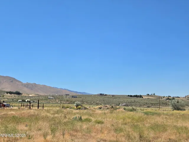 a view of lake with mountain