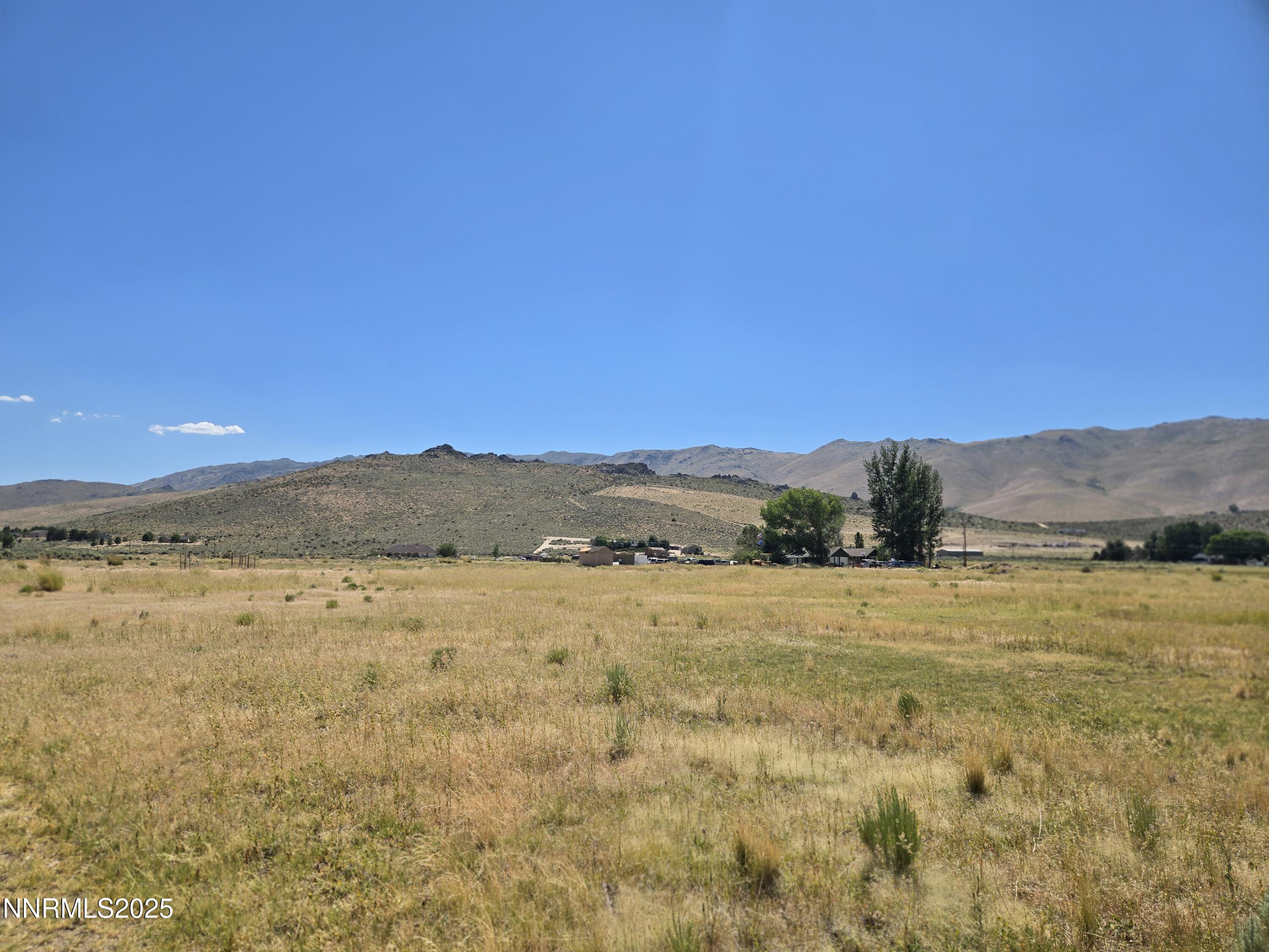 40 Cowhide Circle Reno, NV 89508 - Photo 4 of 19 a view of an ocean beach and mountain