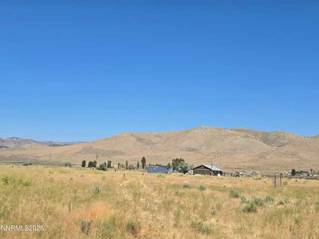 a view of ocean and a mountain