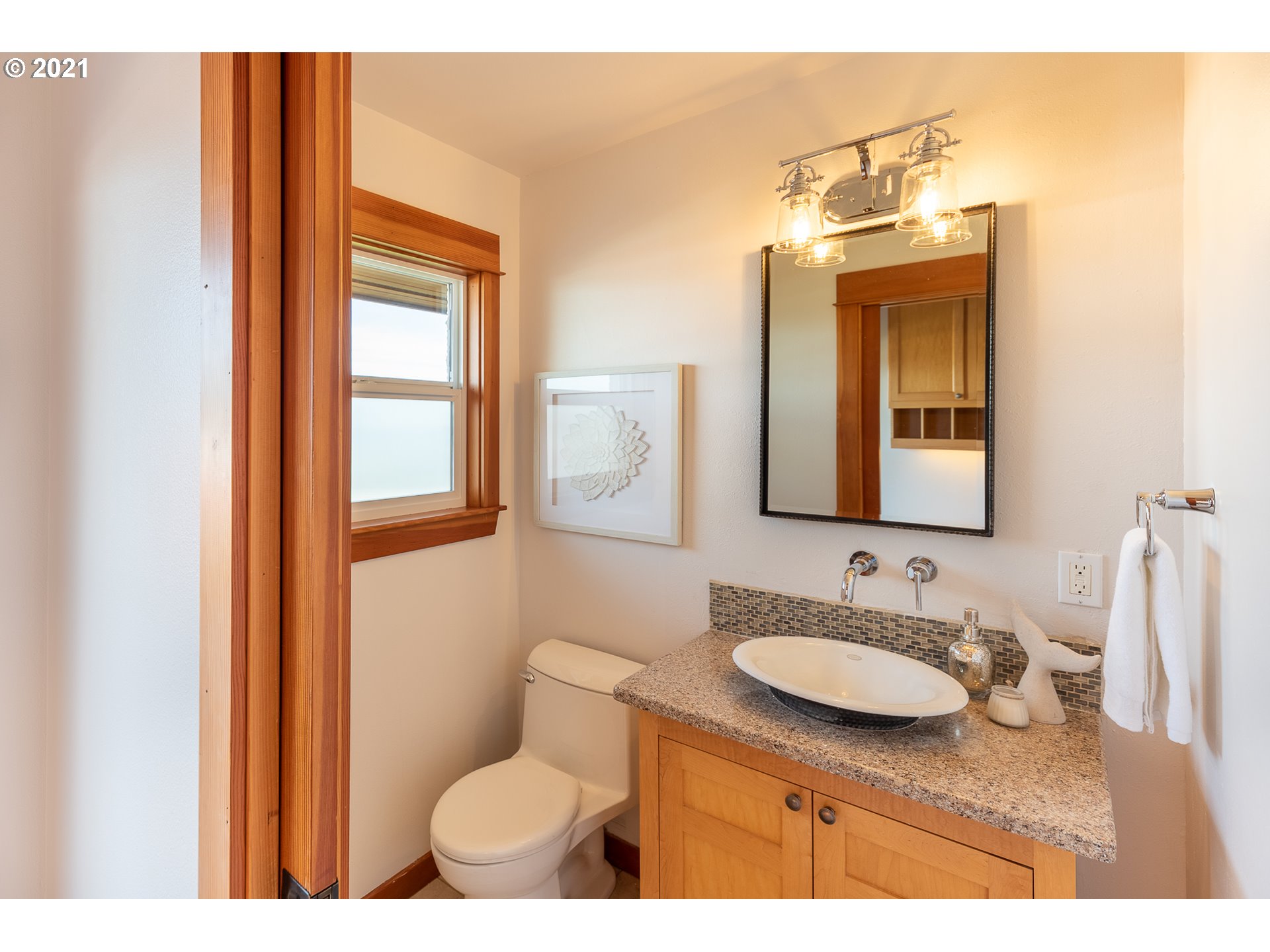 16675 Southwest Parrett Mountain Road Sherwood, OR 97140 - Photo 14 of 31 a bathroom with a granite countertop sink toilet and mirror