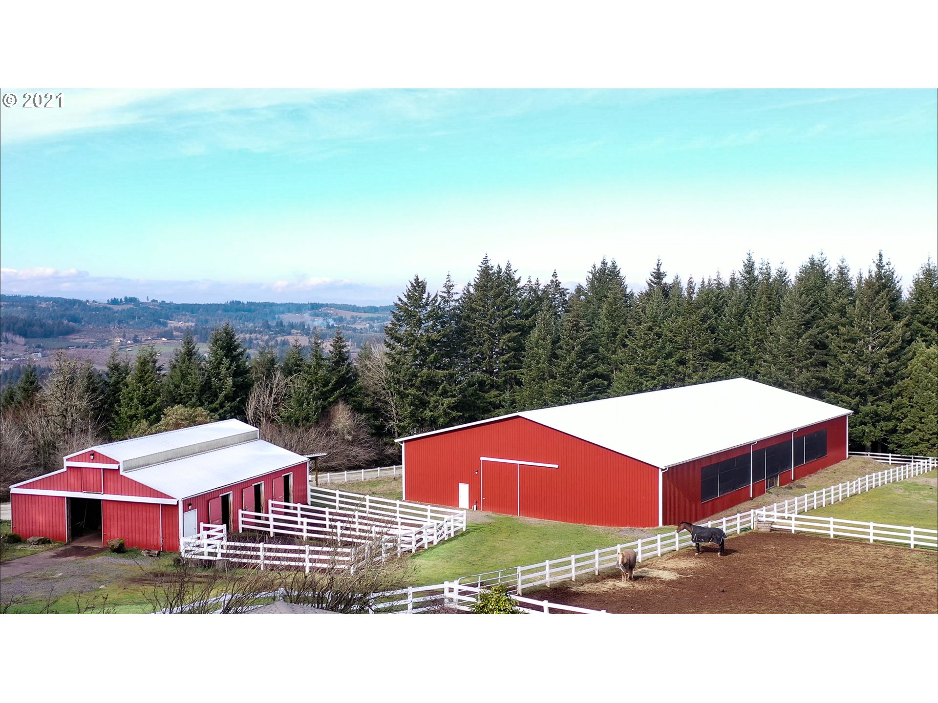 16675 Southwest Parrett Mountain Road Sherwood, OR 97140 - Photo 25 of 31 a view of houses with yard and trees in the background