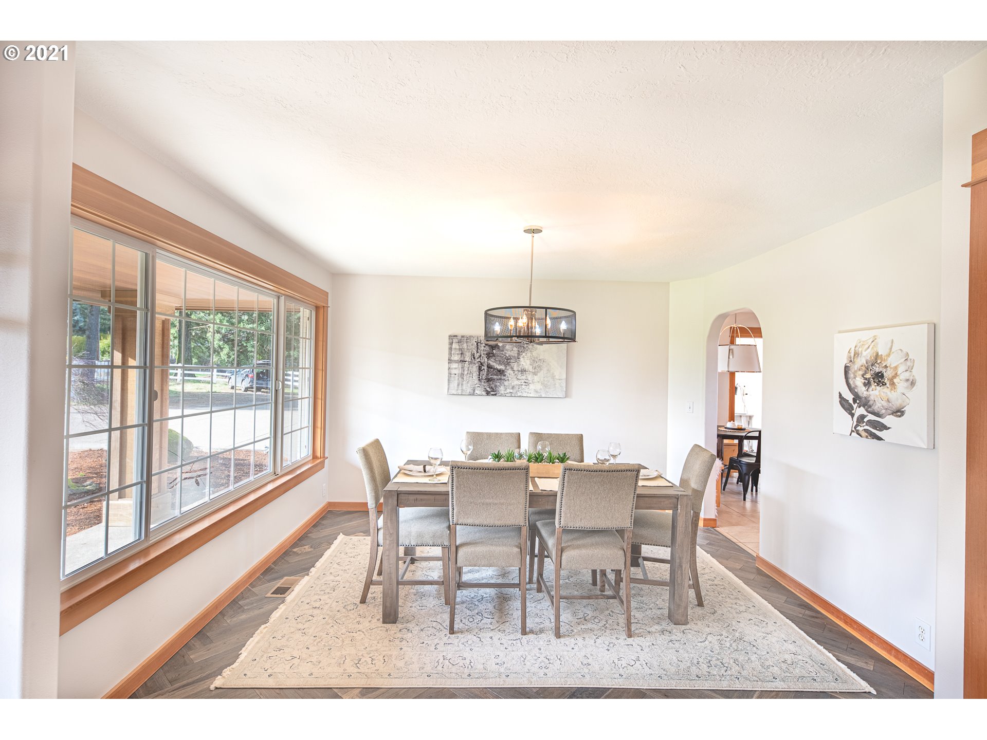 16675 Southwest Parrett Mountain Road Sherwood, OR 97140 - Photo 8 of 31 a dining room with furniture and wooden floor
