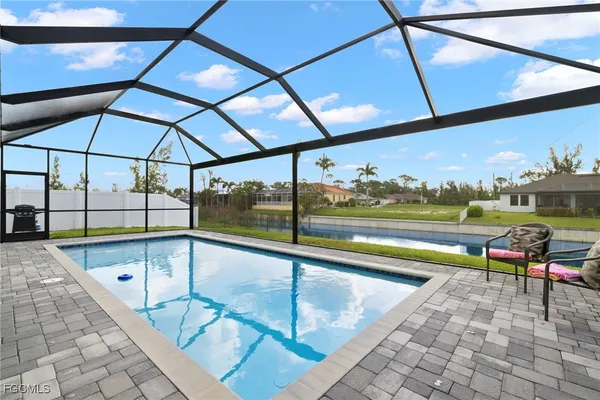 a view of a swimming pool and outdoor space