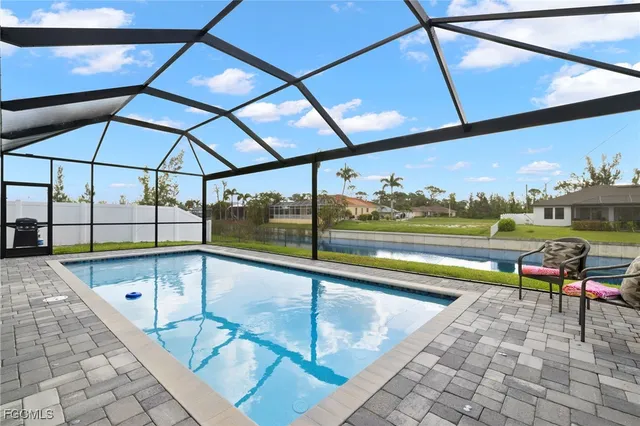 a view of a swimming pool and outdoor space